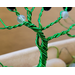 wire twisted tree trunk shown split into 2 trunks decorated with fluorite beads